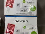 deux boîtes de télécommandes Nintendo Wii posées sur une table