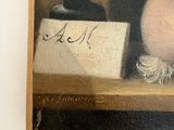 a painting of a man sitting at a desk with a pen and inkwell