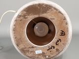 a brown object that is sitting on a table