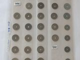 a close up of a bunch of coins on a table