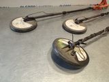 several different types of tools are sitting on a metal surface