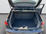 the back end of a car with its trunk open showing the trunk space