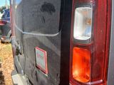 a close up of the tail light of a van