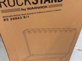 the box is sitting on the ground outside of the store