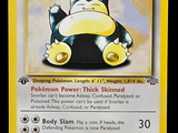 une carte Pokémon représentant un chat noir et blanc