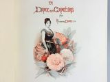 a book with a picture of a woman holding a fan