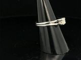 a close up of a ring on a cone on a black surface