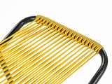 a close up of a yellow and black chair against a white background