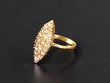 a gold plated ring with a cluster of white diamonds