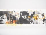 three black and white paintings with yellow paint on them on a white surface