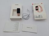 a box with a phone inside of it on a table