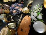 a table with a bunch of jewelry on it
