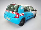 a small blue car with a red and white stripe on it