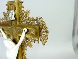 a statue of a person hanging on a cross
