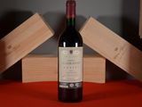 a bottle of wine that is sitting on a table