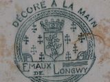 a picture of a stamp on the side of a wall