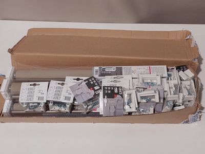 a cardboard box filled with electronic components on a table