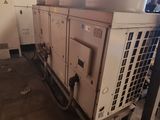 a machine that is sitting inside of a building
