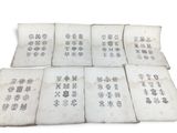 six old books with chinese writing on them sitting on top of each other