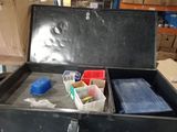 a black box with many different items inside of it