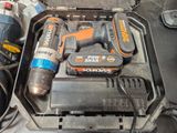 a tool box with a drill and a hammer in it