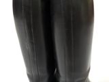 pair of black leather boots on a white background