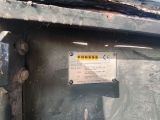 a sign on the side of a dumpster