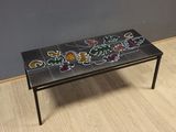 an image of a coffee table with a colorful design on it