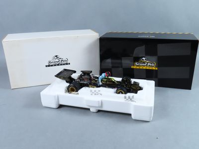 une image représentant une maquette en noir et blanc d'une voiture de course