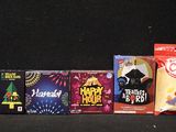 several boxes of fireworks crackers are lined up against a black background