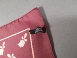 a close up of a pillow with a label on it