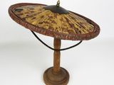 an image of a wooden table with a fan on top of it