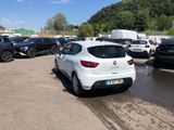 a lot of cars that are parked in a parking lot