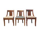 three wooden chairs with striped upholstered seats on a white background