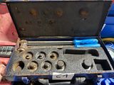 an old tool box that has a bunch of tools inside of it