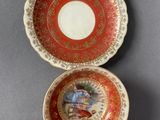 a close up of a cup and saucer on a table