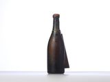 a bottle of wine that is sitting on a table