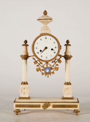 a clock that is sitting on top of a table