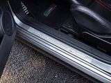 a close up of the inside of a car with the door open