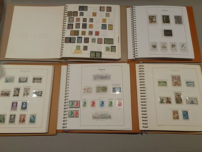 several different types of stamps are displayed on a table