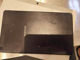 a black tablet computer sitting on top of a table