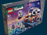 a box of lego friends set with a space vehicle in it