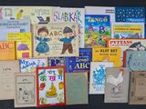 a lot of children ' s books on the table