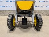 a yellow and gray cart with two yellow wheels