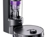 an image of a black and silver vacuum cleaner with a purple light on it