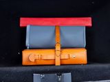 two leather cases in the trunk of a car