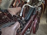 many bicycles that are parked in a garage