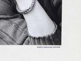 black and white photograph of a woman with a bracelet on her arm