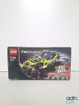 a box of lego technic toys sitting on a table