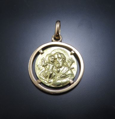 an image of a gold coin with a jesus on it